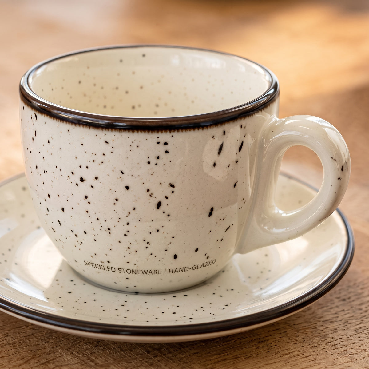 Terra Charcoal speckled stoneware cup and saucer, hand-glazed detail